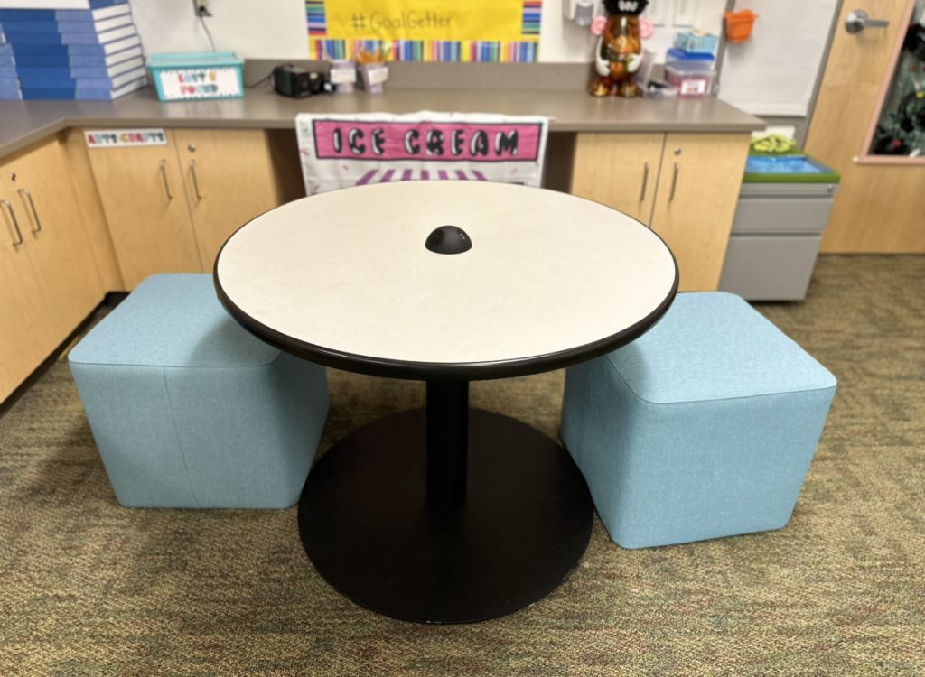 Cafe Table and 2 blue chairs for flexible seating